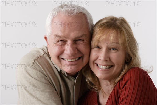 Portrait of elderly couple, studio shot. Photo : Rob Lewine