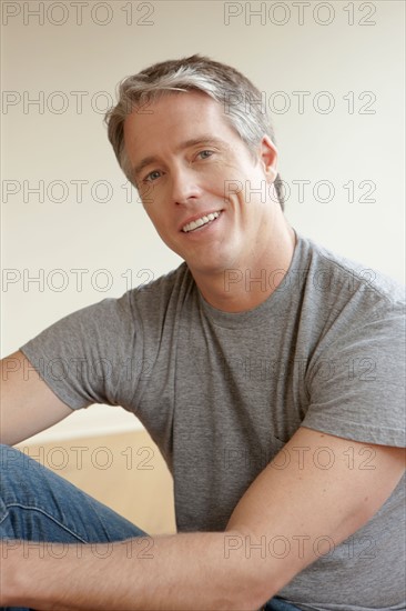 Portrait of cheerful mid adult man. Photo: Rob Lewine