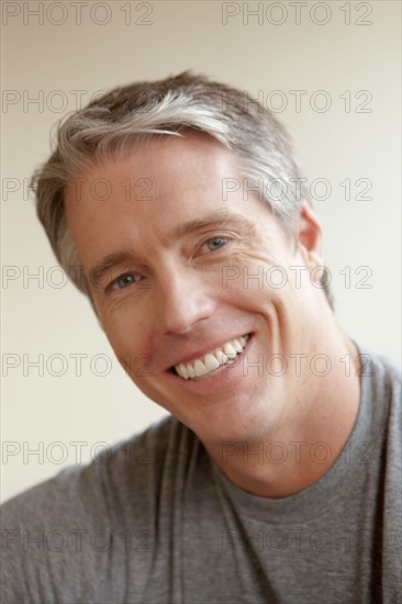 Portrait of cheerful mid adult man. Photo : Rob Lewine