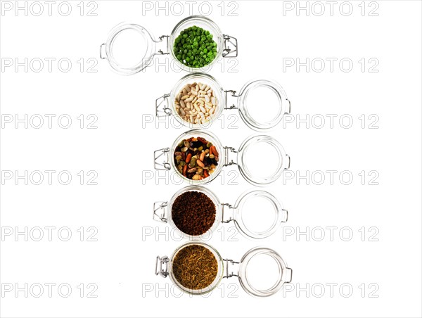 Studio shot of jars with Mixed Seeds on white background. Photo : David Arky