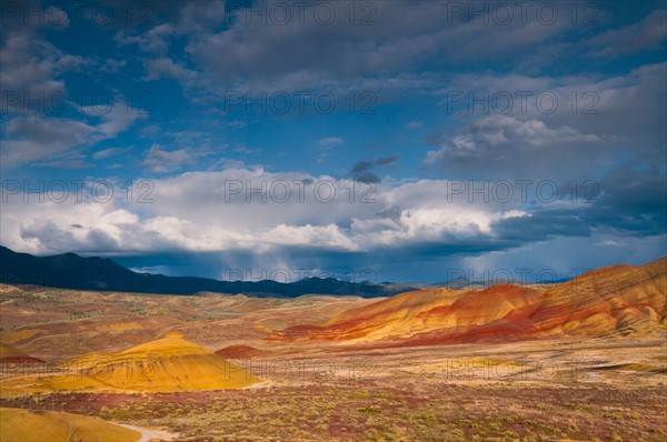 USA, Oregon, Mitchell, Painted Hills with storm clouds. Photo: Gary J Weathers