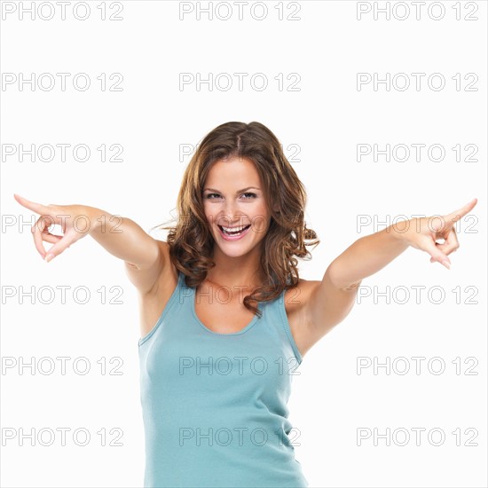 Studio portrait of attractive young woman at camera. Photo: momentimages