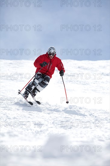 Male skier on fresh powder snow