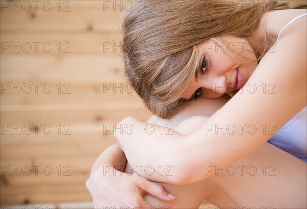 Woman relaxing in spa. Photo : Jamie Grill