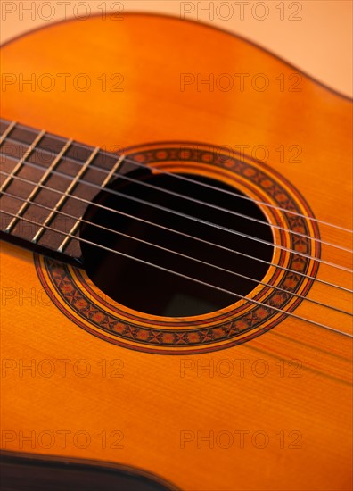 Close up of acoustic guitar. Photo : Daniel Grill