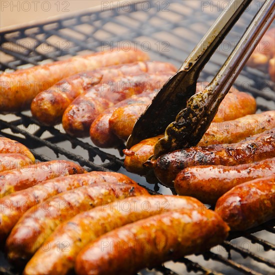 Sausages on barbeque.