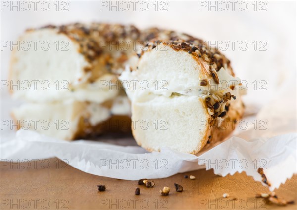 Close up of bagel with cream cheese. Photo : Jamie Grill