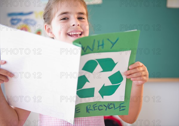Portrait of schoolgirl ( 6-7) presenting environmental knowledge. Photo: Jamie Grill