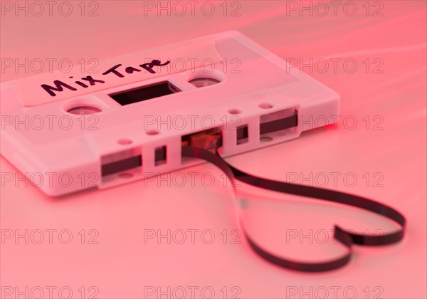 White mix tape with heart shape, studio shot. Photo : Daniel Grill