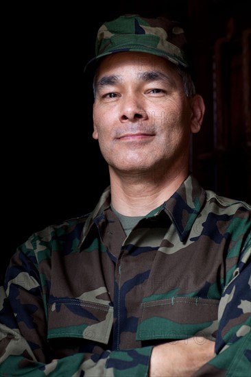 Portrait of mature man wearing military uniform. Photo: db2stock