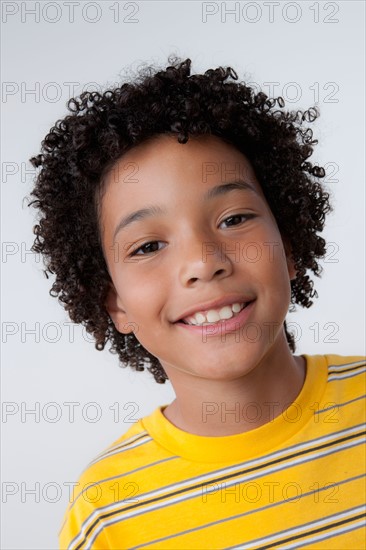 Studio portrait of boy (8-9). Photo : Rob Lewine