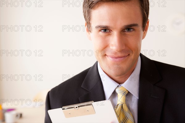 Portrait of businessman. Photo : Rob Lewine