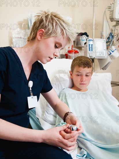 Nurse and boy (10-11).