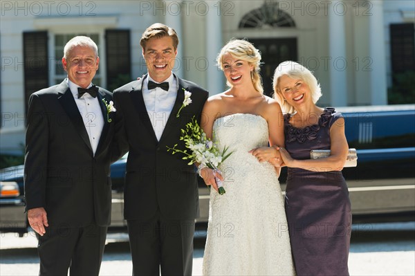 Portrait of married couple with parents.