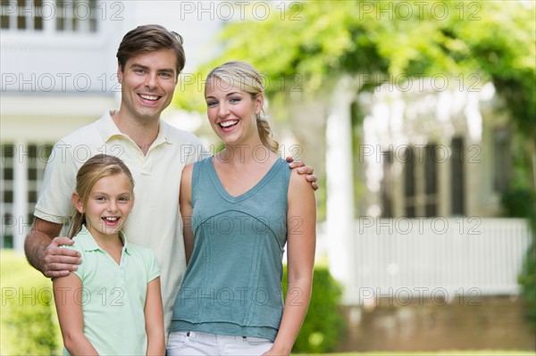 Portrait of family with daughter (10-11).