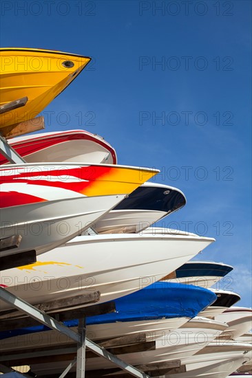 Boats stacked on rack. Photo : John Kelly