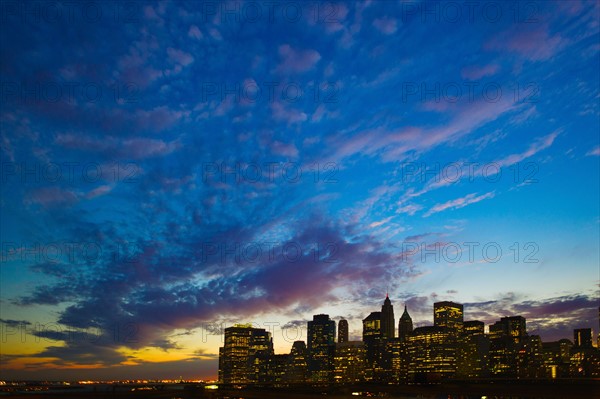 USA, New York City skyline at dusk.