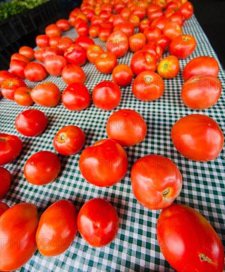 Tomatoes on table.