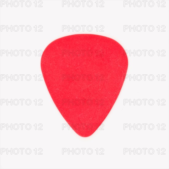 Close-up of guitar pick, studio shot. Photo: Daniel Grill