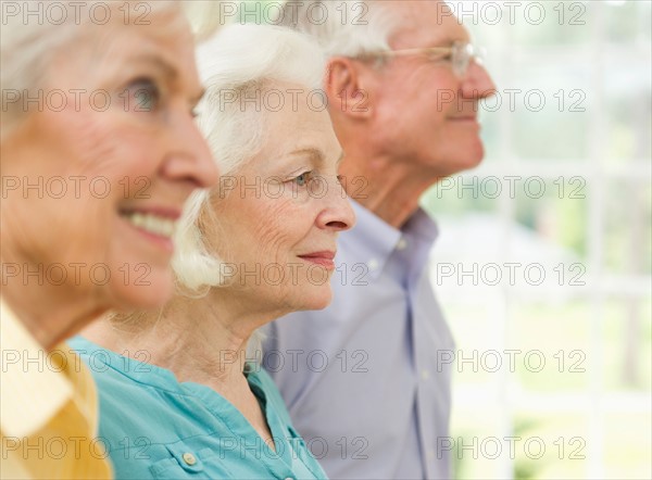 Profiles of senior women and senior man.