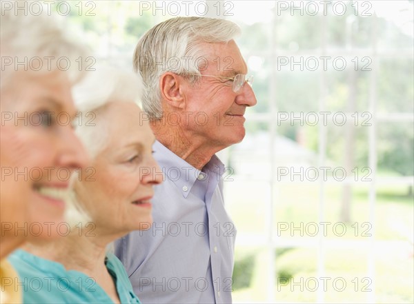 Profiles of senior women and senior man.