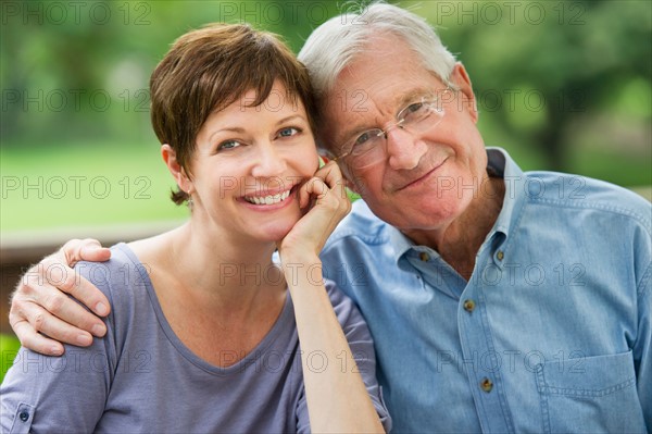 Portrait of father and adult daughter.