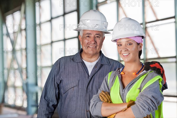 Portrait of male and female manual workers. Photo : db2stock