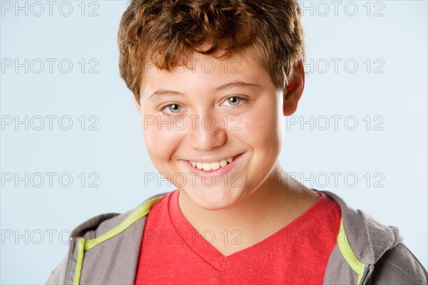 Studio portrait of boy (12-13). Photo : Rob Lewine