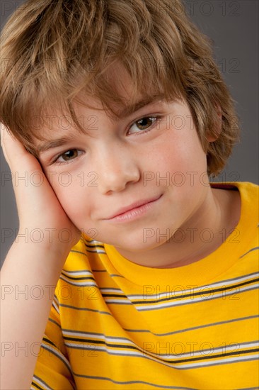 Studio portrait of boy (8-9). Photo: Rob Lewine