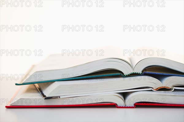 Studio shot of open books.