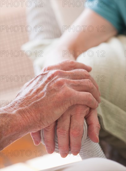 Wrinkled hands of Senior people.