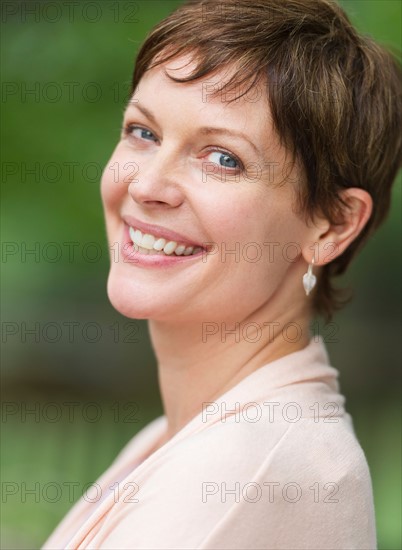 Portrait of mature woman smiling.