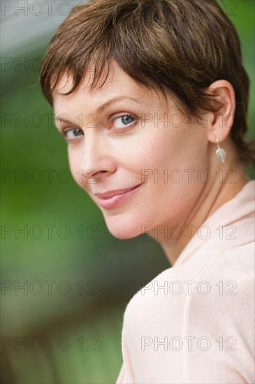 Portrait of mature woman smiling.