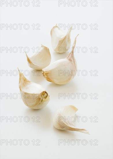 Studio shot of fresh garlic cloves.