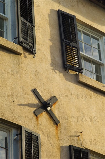 USA, South Carolina, Charleston, Close up of hurricane clamp of building wall.