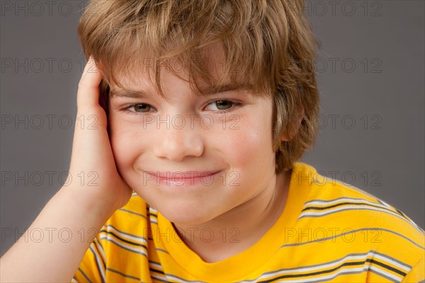 Studio portrait of boy (8-9). Photo : Rob Lewine