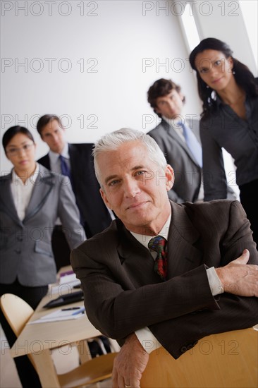 Studio shot of business people. Photo : Rob Lewine