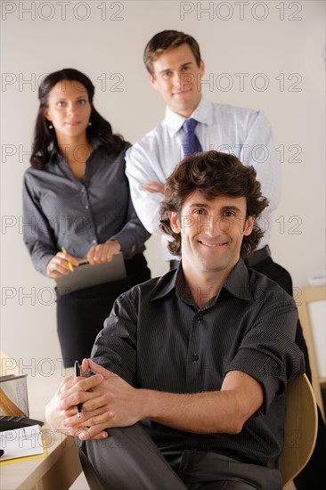 Portrait of business people in office. Photo : Rob Lewine