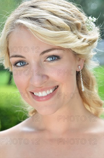 Portrait of smiling bride.