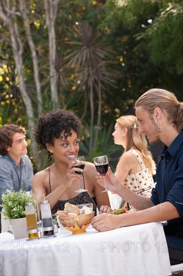 Couple dining in outdoor restaurant. Photo : Rob Lewine