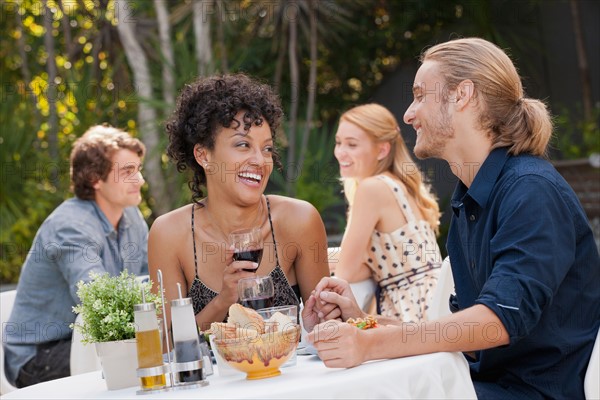 Couple dining in outdoor restaurant. Photo: Rob Lewine