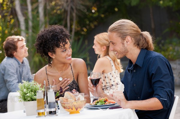 Couple dining in outdoor restaurant. Photo: Rob Lewine