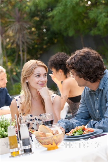 Couple dining in outdoor restaurant. Photo: Rob Lewine