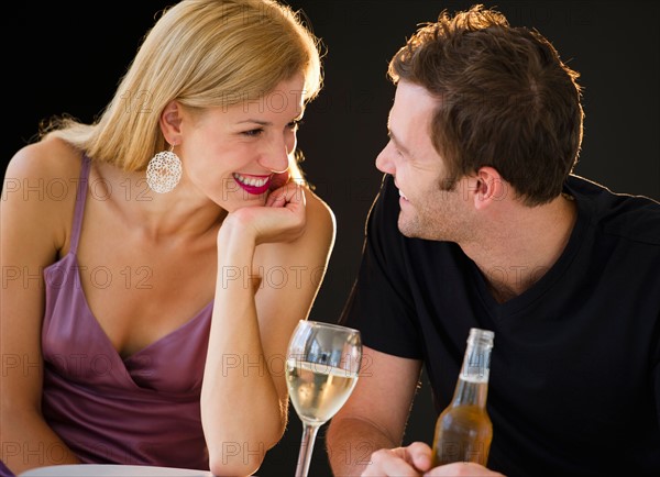 Romantic couple with drinks.