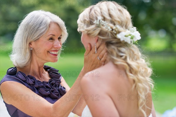 Bride with mother at wedding day.