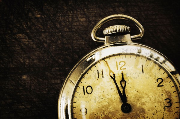 Old-fashioned pocket watch, studio shot.