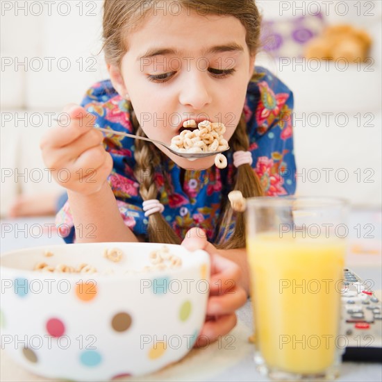 Girl ( 6-7) eating cereals. Photo: Jamie Grill