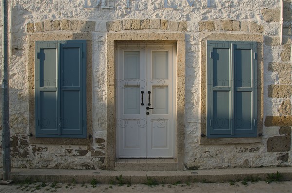 Turkey, Cesme, Alacati, facade of traditional house. Photo : Tetra Images