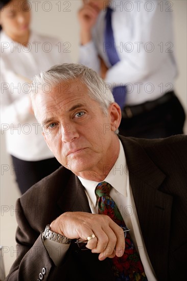 Portrait of serious senior businessman. Photo: Rob Lewine