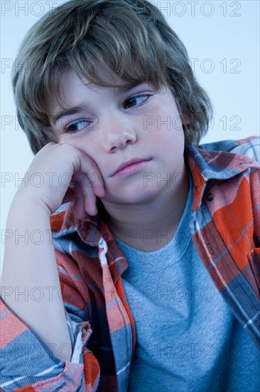 Studio portrait of boy (8-9). Photo : Rob Lewine